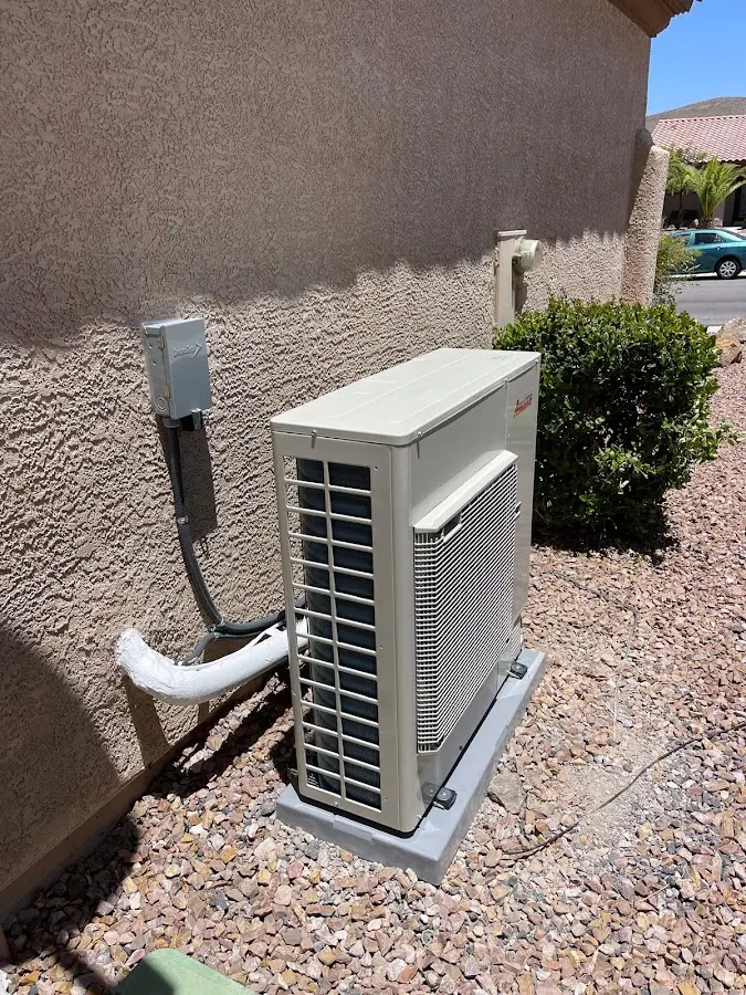 Residential air conditioning condenser unit in Wilna